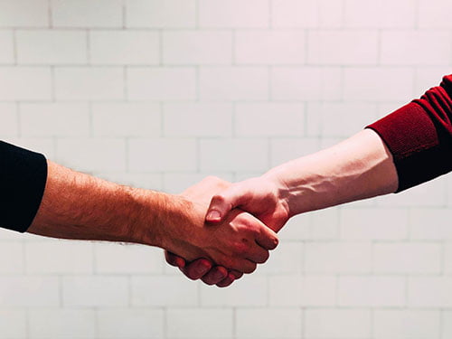 Shareholder agreement | photo of a handshake